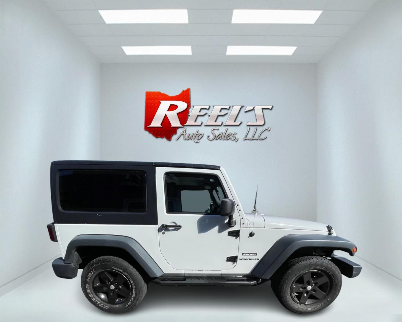 2013 White /Black Jeep Wrangler Sport 4WD (1C4AJWAG7DL) with an 3.6L V6 DOHC 24V engine, 6 Speed Manual transmission, located at 11115 Chardon Rd. , Chardon, OH, 44024, (440) 214-9705, 41.580246, -81.241943 - Photo#6